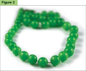 Photo courtesy Canadian Gemological Laboratory (CGL) This necklace was presented as jadeite jade by a client at our offices. Testing revealed it to be dyed quartzite.