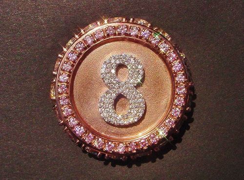 A gold and diamond poker chip by Gerald Lewy certified as the most valuable by Guinness World Records at an appraised value of $450,000. Sunburst