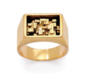 Photo courtesy Dupuis Fine Jewellery Auctioneers 18-karat gold ring decorated with a cluster of tiny ingots by Karl Stittgen.