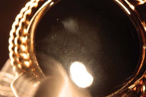 Photo courtesy Mark T. Cartwright Only fibre-optic illumination was capable of revealing the devitrification that proved the 'black onyx' in this pearl clasp was in fact glass.