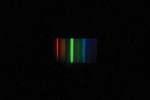 Photo courtesy Mark T. Cartwright The three strong emission spikes of cool-white fluorescent tubes are clearly visible using a diffraction grating spectroscope and are the primary wavelengths produced.