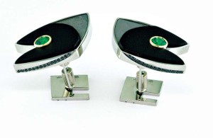 Photo courtesy AGTA. Photos by Robert Weldon. 'Green Arrow' cufflinks in white gold, with black jade, meteorite, round bezel-set tsavorite garnets, and bead-set black diamonds.