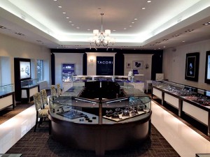 Photo courtesy Artco Group This store's designer looked to create a warm and elegant space that was easy for customers to navigate. Transparencies that look like picture frames help promote products.