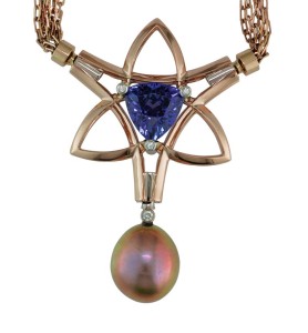 Photo courtesy Llyn L. Strelau 18-karat rose gold clasp pendant with 19-karat white gold and diamond accents set with tanzanite and metallic freshwater pearl on a rose gold chain.