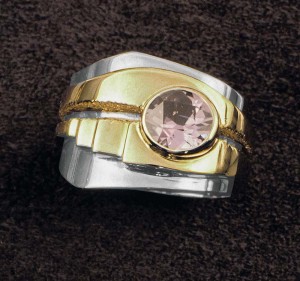 Photo courtesy Llyn L. Strelau All jewellery tells a story and this ring is no exception. For instance, the rugged edges of the gap between the two bands seen here symbolize the rupture of loss for this ring's owner.