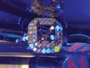 Photo courtesy HKD Diamond Laboratories Canada The bright fluorescence observed in this photo indicates the diamond is lab-grown. Testing small diamonds is a tedious process, which helps fuel the problem of undisclosed synthetics further.