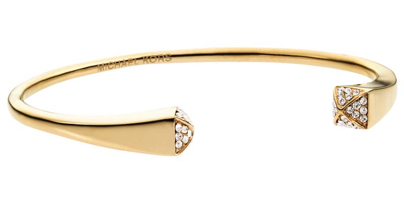 Gold-tone stainless steel cuff bracelet by Michael Kors, with IP finish and crystals.