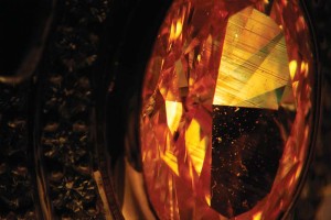 Photo courtesy Mark T. Cartwright This fancy intense yellow diamond shows an internal grain pattern consistent with a natural diamond. However, the weak yellowish-green UV fluorescence indicates possible HPHT treatment and advanced testing may be required.