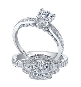 (Top) 18-karat white gold engagement ring set with a .80-carat round brilliant Canadian centre diamond. (Bottom) 18-karat white gold engagement ring set with one-carat cushion-cut Canadian centre diamond. Both rings by Corona Jewellery Co.