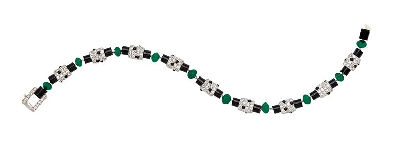 Photo courtesy Dupuis Fine Jewellery Auctioneers Signed art deco emerald, onyx, and diamond bracelet, circa 1920, by Cartier.