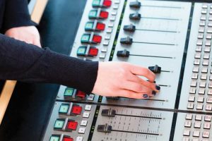 Photo courtesy Bigstock.com bigstock-Presenter-in-radio-station-hos-64908388