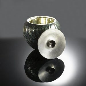 Crafted by U.K. metalsmith Wayne Meeten, this recently stolen hollowware piece is a bowl and lid featuring the Mokume-gane technique and silver gilt faceting. Photo courtesy Rio Grande