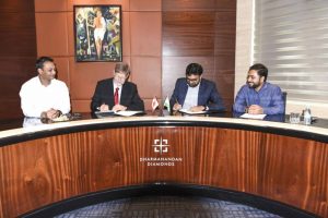 An agreement has been signed between Dharmanandan Diamonds and Saskatchewan’s Mike Botha. From left to right: Shailesh Patel, diamond cutter Mike Botha, DDPL managing director Hitesh Patel, and Vipul Sutariya. Photo courtesy Dharmanandan Diamonds