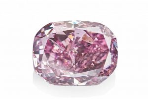 This 11-carat, cushion-cut, fancy deep purple-pink diamond will be sold at the upcoming ‘True Colours’ auction in Hong Kong. Photo courtesy Alrosa