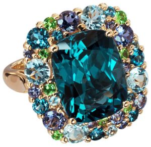 Colourful jewellery was on the agenda at many booths. Pictured is a blue topaz centre stone with multi-gem accents in an 18-karat gold ring by Isabelle Langlois (France).
