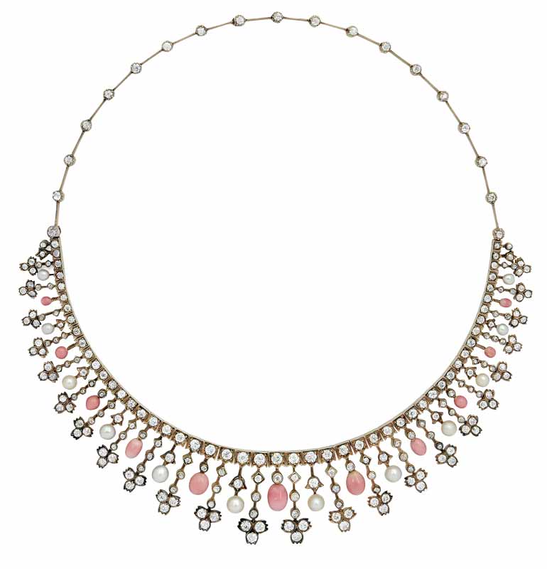 A rare antique conch pearl, pearl, and diamond necklace from the late 19th century.