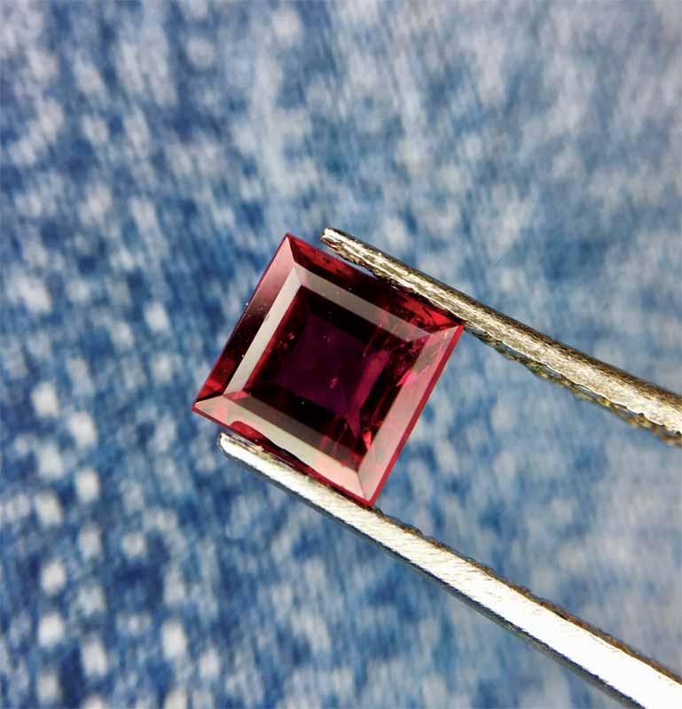 Rubellite, such as the 0.58-carat piece pictured, offers good hardness, good lustre, and comparatively low cost.