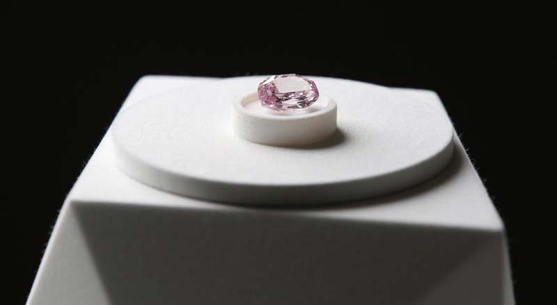 Photo courtesy Alrosa Alrosa previewed a 14.83-carat pink oval diamond, the largest of its kind to be discovered in Russia.