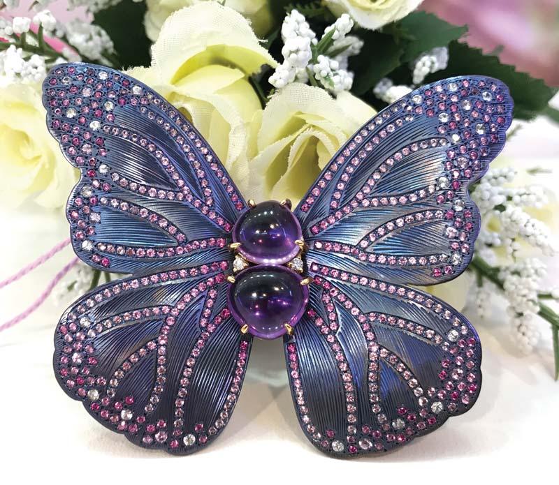 Photo© Cynthia Unninayar ‘Butterfly’ brooch in titanium set with amethysts, sapphires, and diamonds by Japanese designer May Jewelry.
