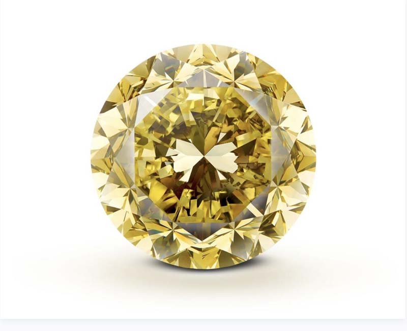Photo courtesy Mouawad The 54.21-carat round brilliant-cut, fancy vivid yellow ’Mouawad Dragon’ diamond is being called the largest of its kind in the world.