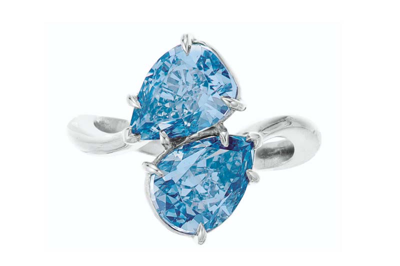 Photos courtesy Christie’s A twin-stone fancy vivid blue diamond ring sold for more than $6.7 million at Christie’s New York Magnificent Jewels auction.