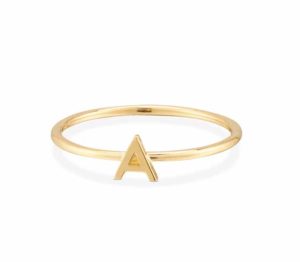 1.2-mm 14-karat gold solid gold ring set with an initial letter by Mejuri. <br /> <span style="font-size: 10pt; font-family: arial, helvetica, sans-serif;"><i>Photo courtesy Mejuri</i></span>