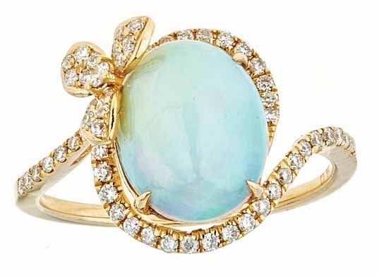 18-karat yellow gold ring by Cirari featuring a 2.28-carat opal centre stone and round diamonds.