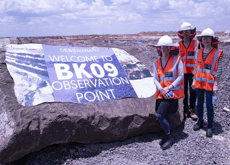 From left, Milevsky, Fitzell, and Mireskandari visit Damtshaa Mine.