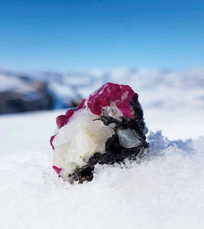 Greenland ruby rough on a host rock. Photo ©Vincent Pardieu for Greenland Ruby