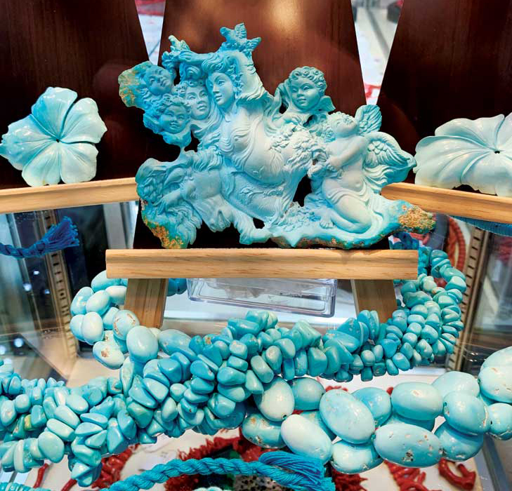 A natural turquoise sculpture displayed at the Gem and Jewelry Exchange (GJX) show.