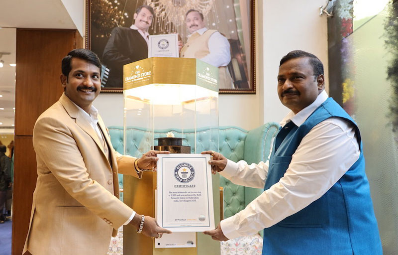 Kotti Srikanth, pictured with his father, Chandubhai, achieved the record. Photo courtesy the Diamond Store by Chandubhai