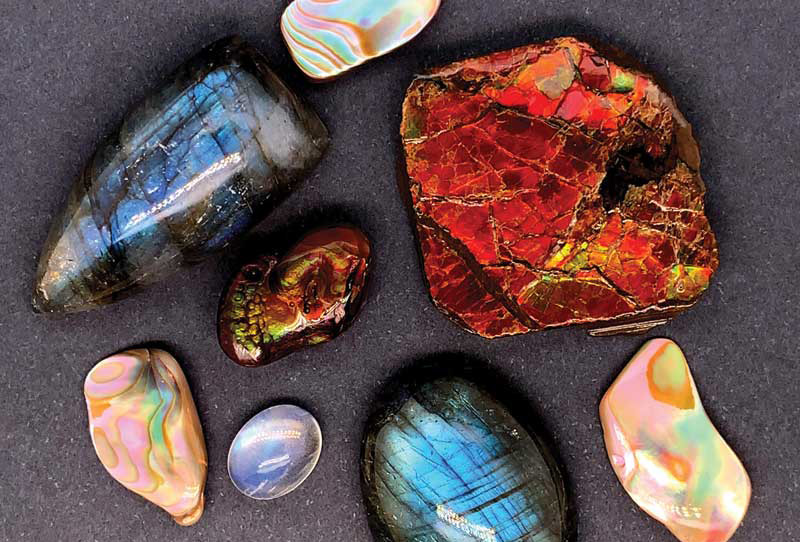 Gemstones showing adularescence (moonstone), labradorescence (Labradorite), orient (nacre), and iridescence (fire agate). Photos by Lauriane Lognay/Rippana Inc.