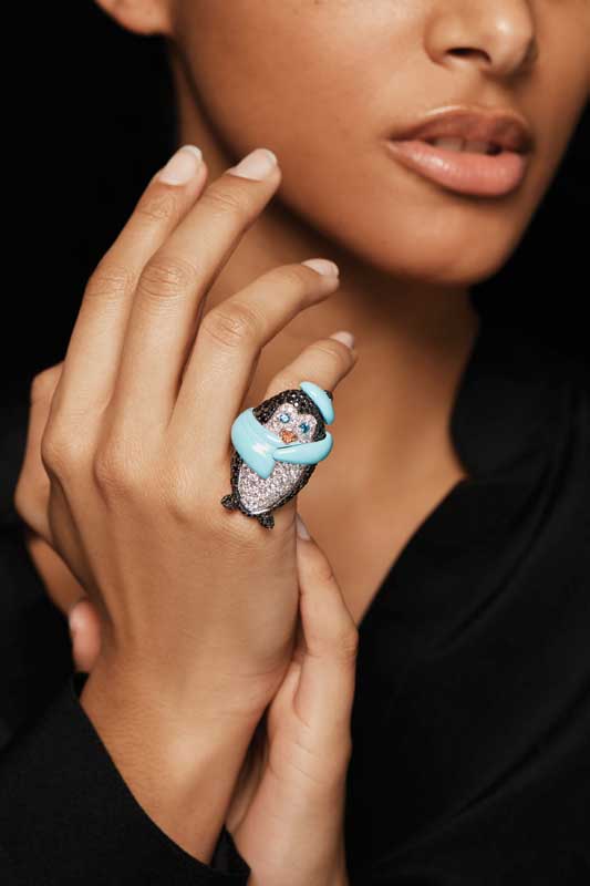 18-karat white gold ring by Fawaz Gruosi, set with 58 brilliant-cut white diamonds, 183 brilliant-cut black diamonds, two brilliant-cut paraïba topazes, 10 brilliant-cut orange sapphires, and turquoise ceramic. Photo courtesy Fawaz Gruosi