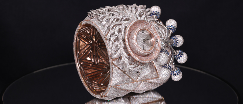 A timepiece showcasing 17,512 white diamonds and 12 black diamonds has broken a Guinness World Record. Photos courtesy IGI