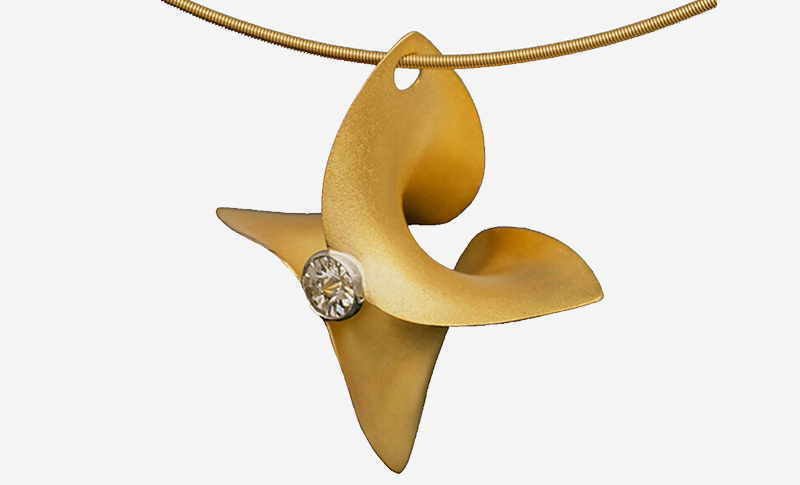 While most modern jewellery is cast in a mould, stamped by a machine, or formed from wire, a few innovative individuals have been creating pieces from a thin, flat sheet, or strip of metal. If this material is hammered over a snake-like stake of steel, wood, or plastic, the flat sheet can be curved both upward and downward at right angles by compressing the centre and stretching the edges, as seen in the hyperbolic pendant in Figure 1. The pattern of the sheet determines the resulting form, but many different shapes can be made from the same pattern.