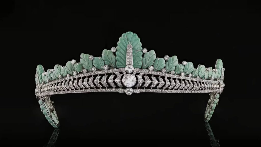 Close-up front view of a turquoise and diamond tiara.