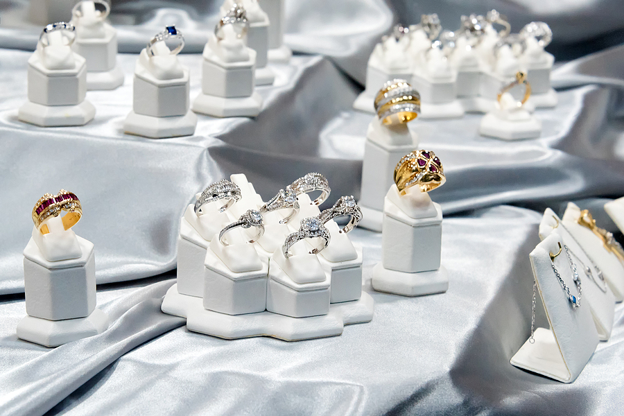 Diamond rings in a jewellery store window display showcase.