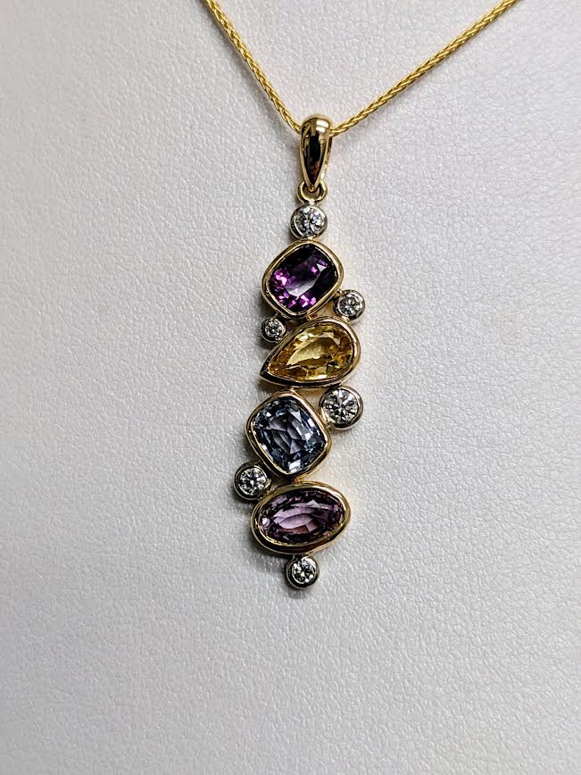 Pendent in multiple shapes with several coloured gemstones