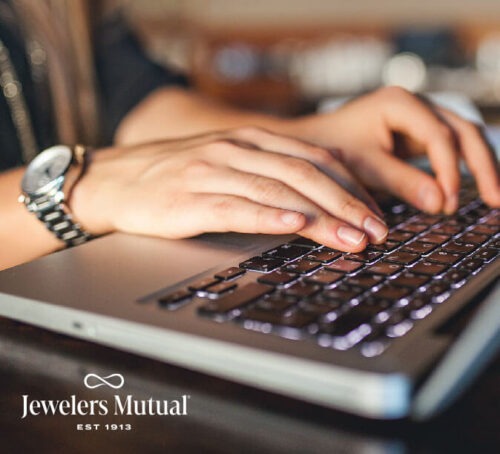 A person uses a laptop.