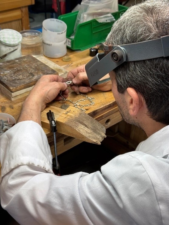 Artisan crafting jewellery.