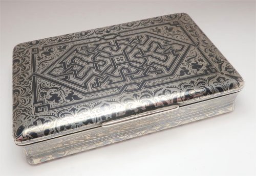 A silver box, made in France, in a method called niello.