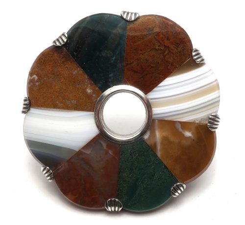 An agate, bloodstone, and jasper brooch, in silver.