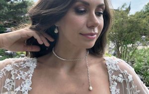 close up of pearl necklace and earrings