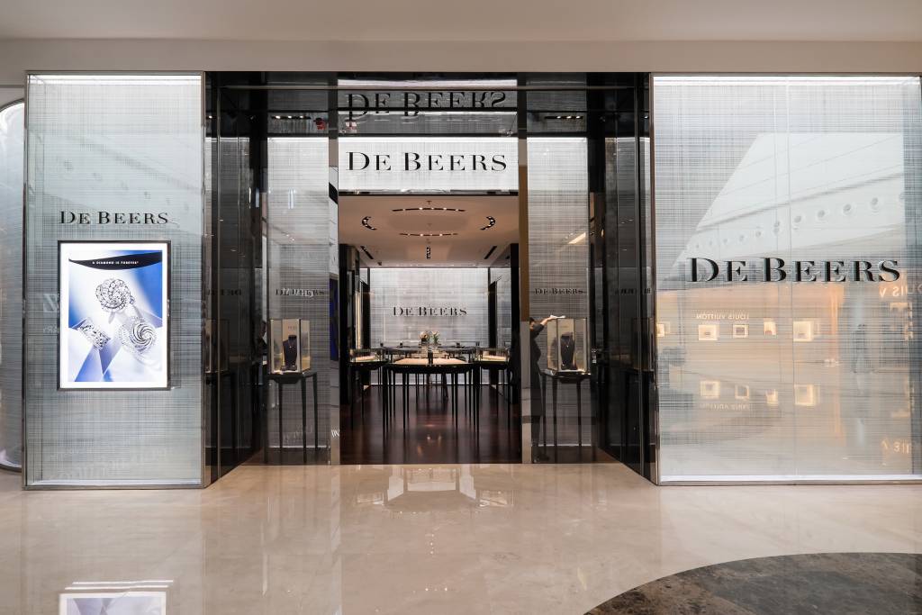 An exterior shot of a De Beers storefront.