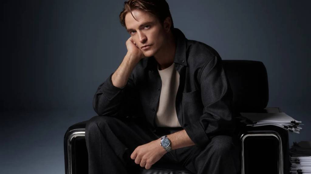 Robert Pattinson models with the watch.