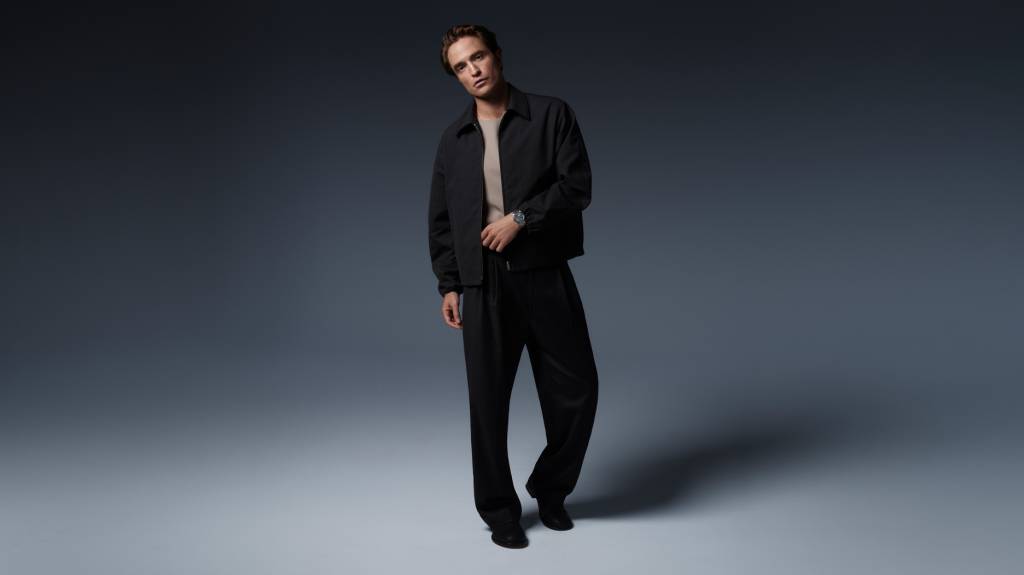 Robert Pattinson models with the watch.